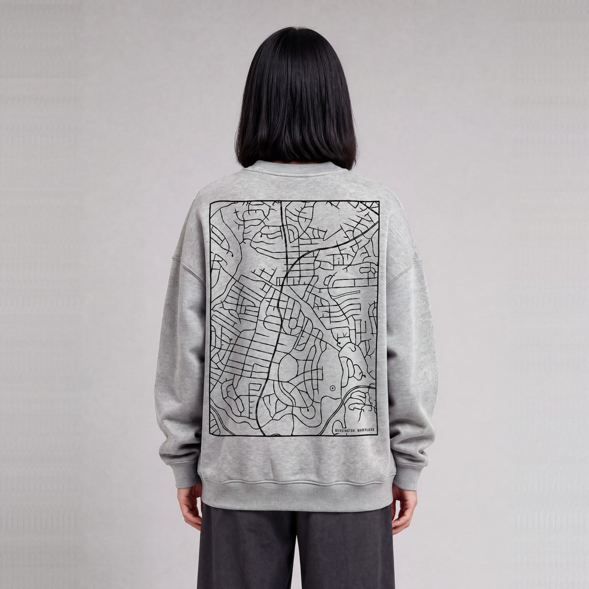 Kensington map sweatshirt, back print on model - Heather Gray