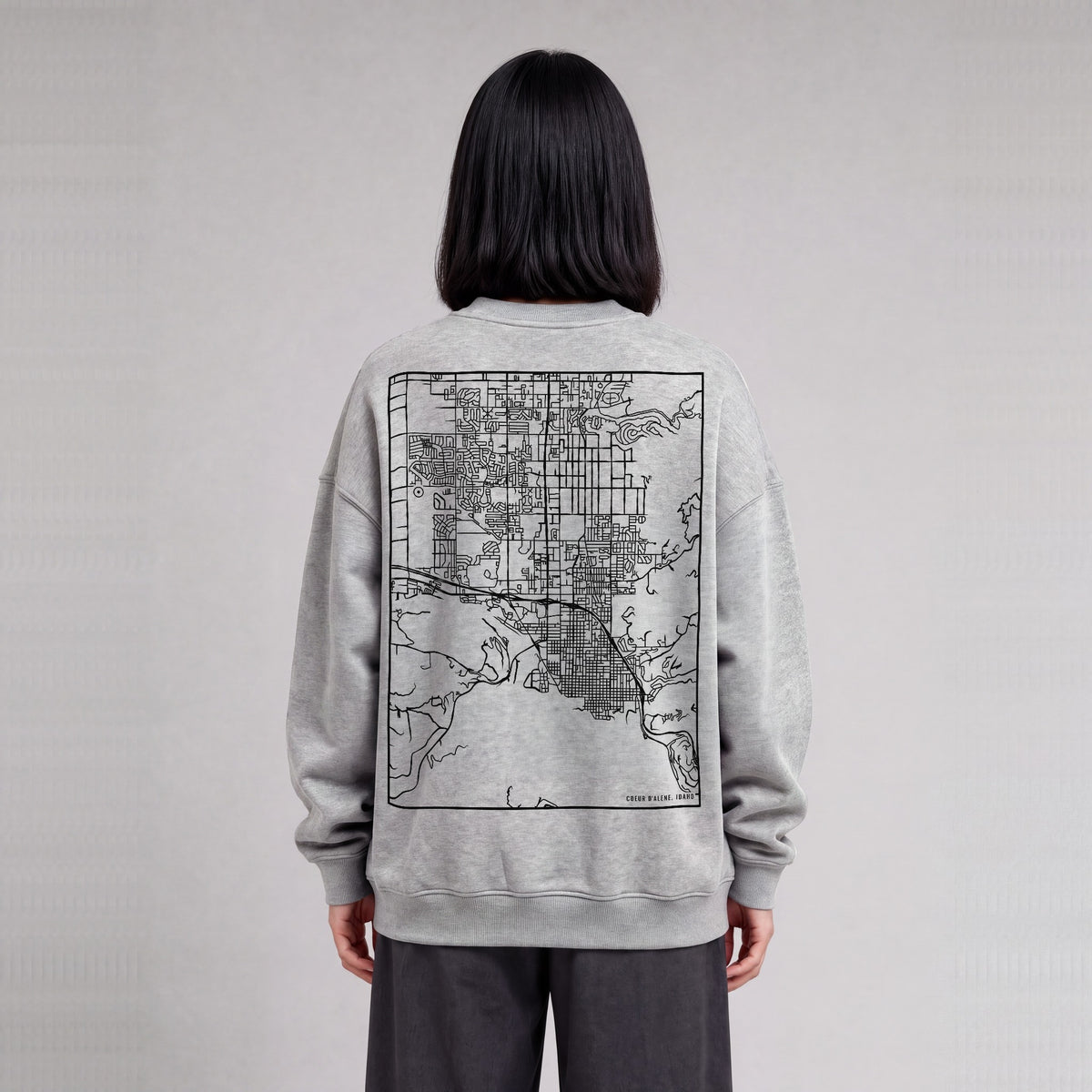 Coeur d'Alene map sweatshirt, back print on model - Heather Gray
