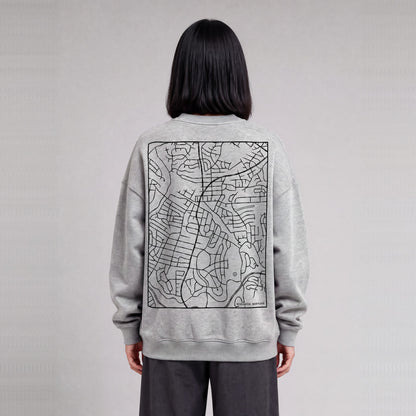 Kensington map sweatshirt, back print on model - Heather Gray