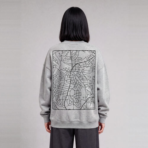 Kensington map sweatshirt, back print on model - Heather Gray