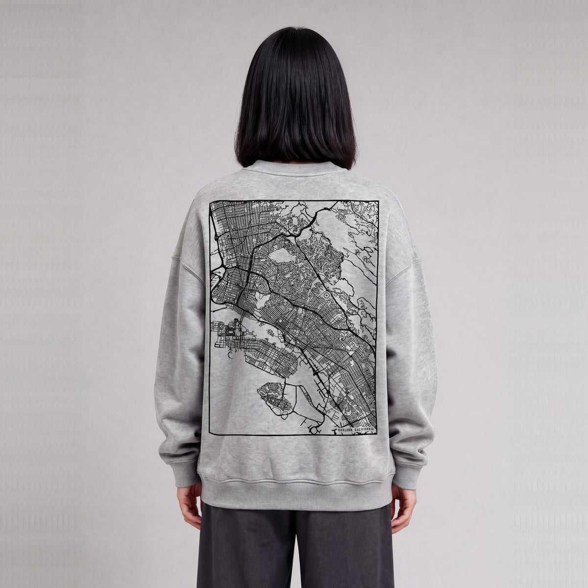 Oakland map sweatshirt, back print on model - Heather Gray