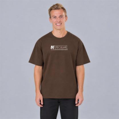 Be Peculiar tee front print on model - Coffee