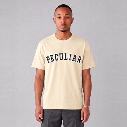 "Peculiar" collegiate tee front print on model - Cream