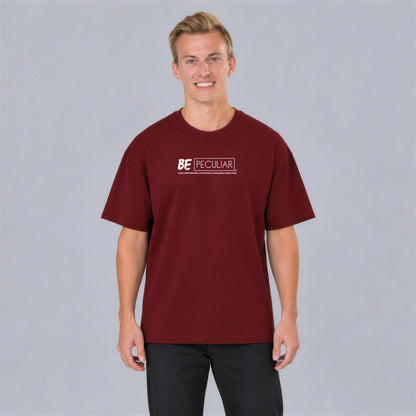 Be Peculiar tee front print on model - Maroon