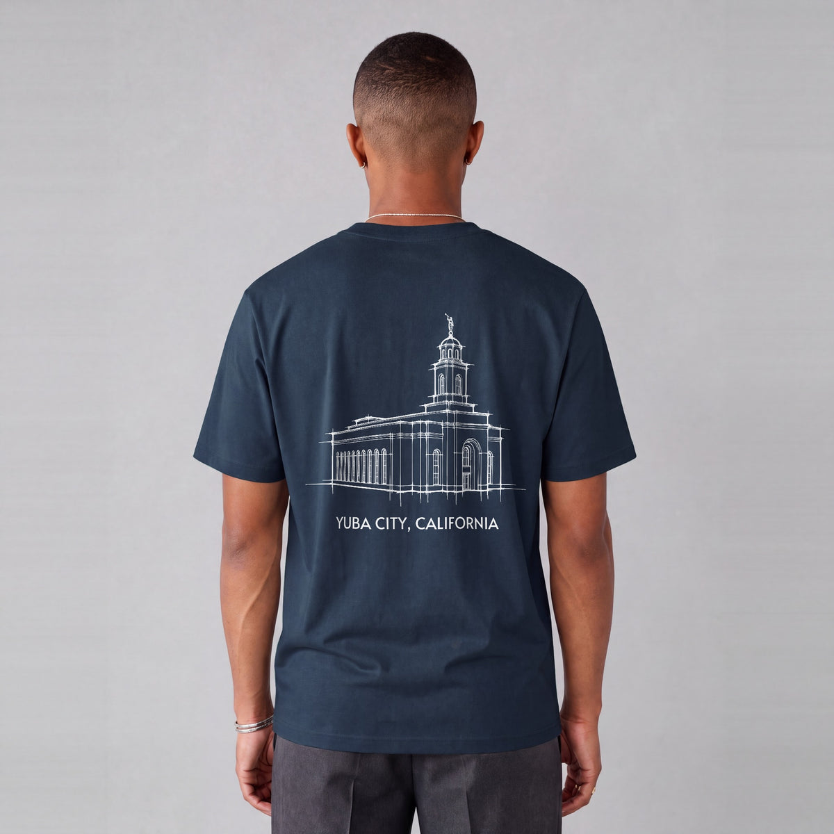 Feather River Temple back print on model - Navy Blue