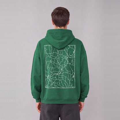 Afton map hoodie, back print on model - Eden Green
