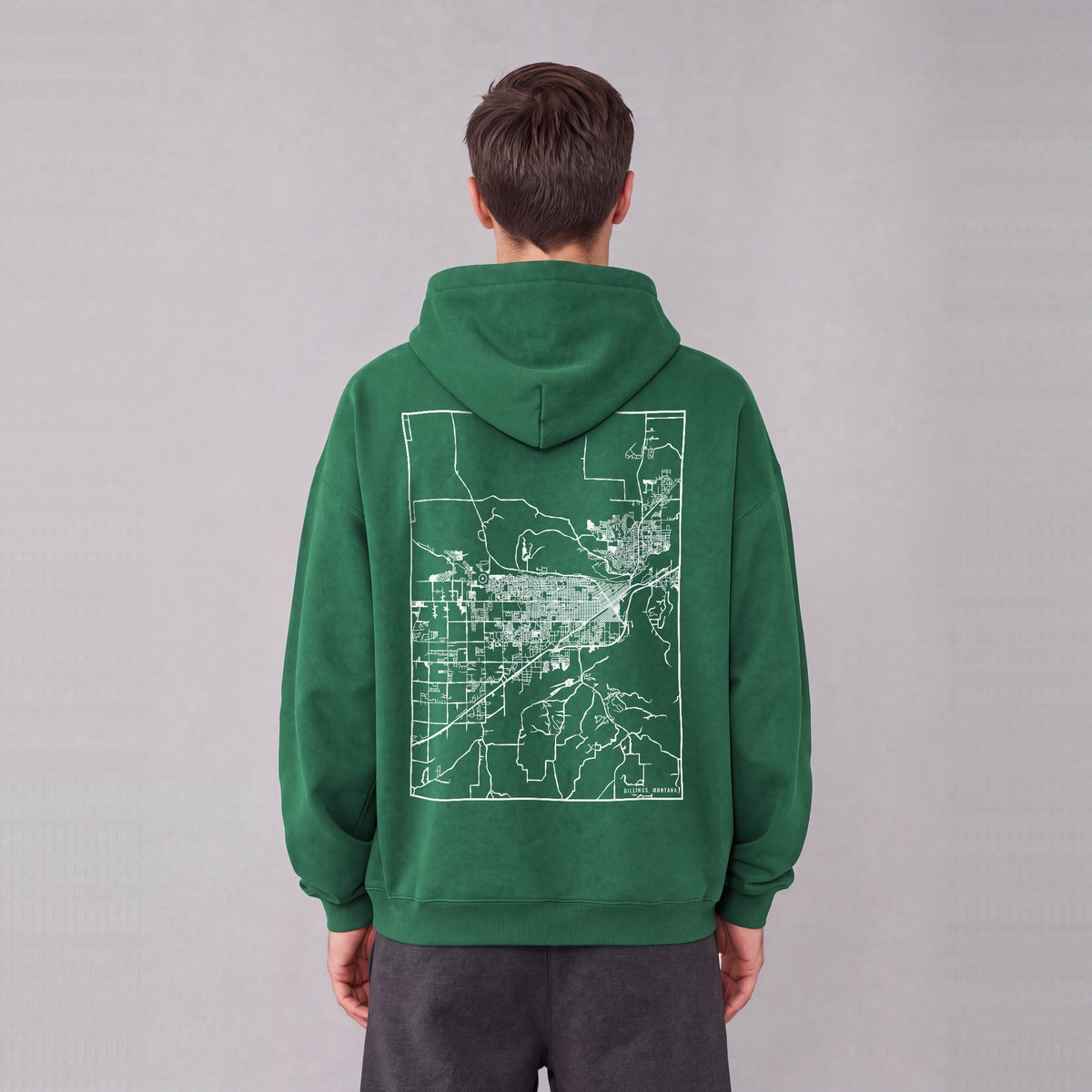 Billings map hoodie, back print on model - Eden Green
