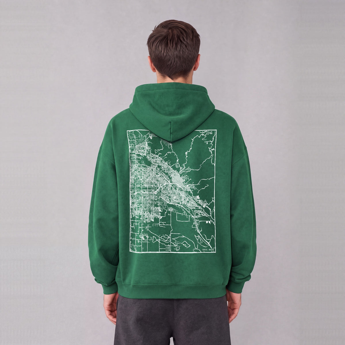 Boise map hoodie, back print on model - Eden Green