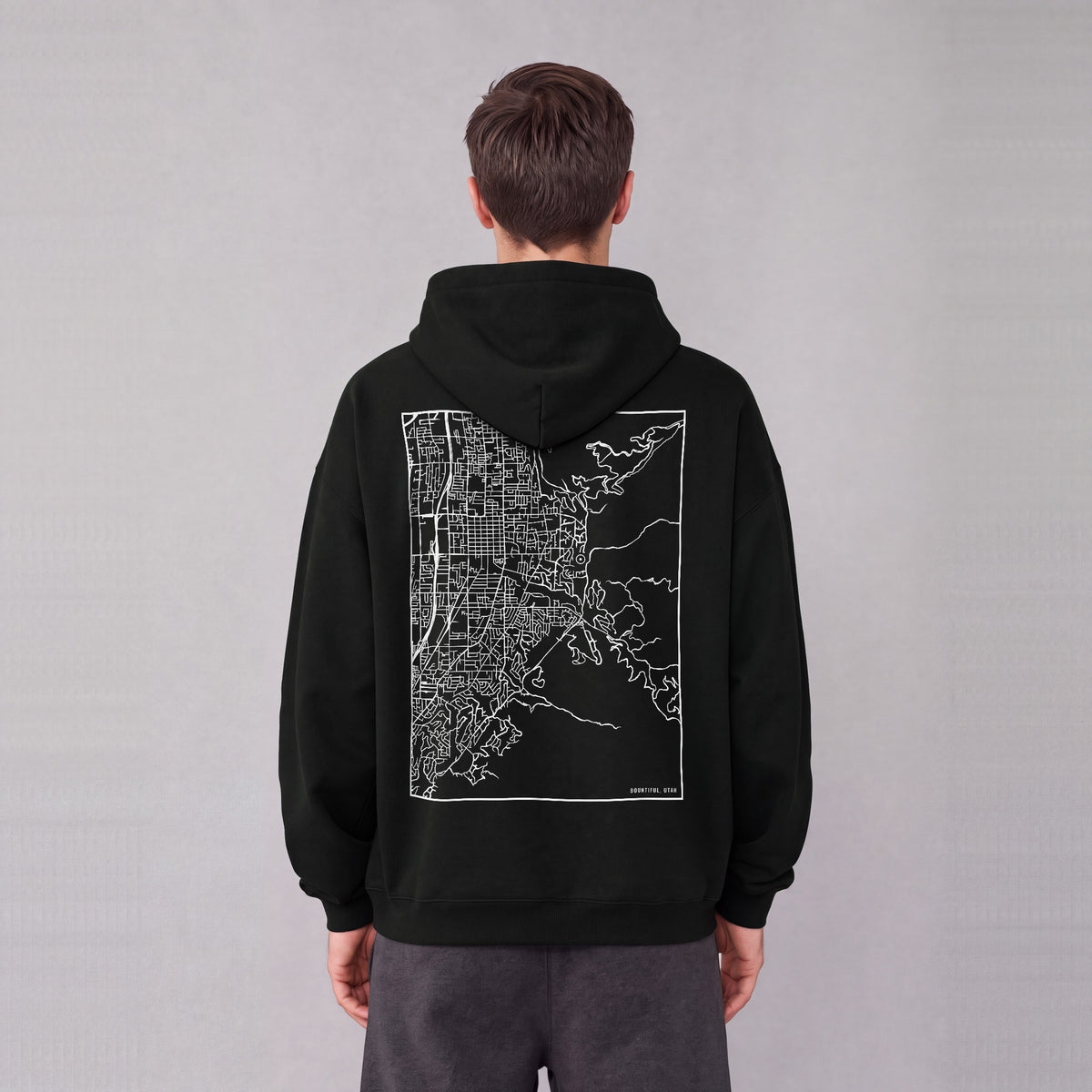 Bountiful map hoodie, back print on model - Black