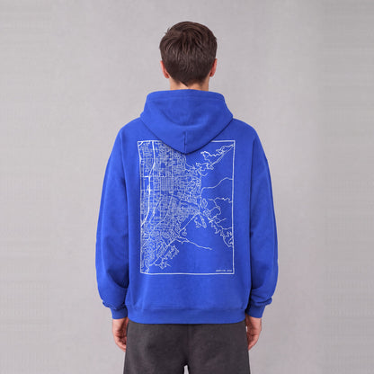Bountiful map hoodie, back print on model - Royal Blue
