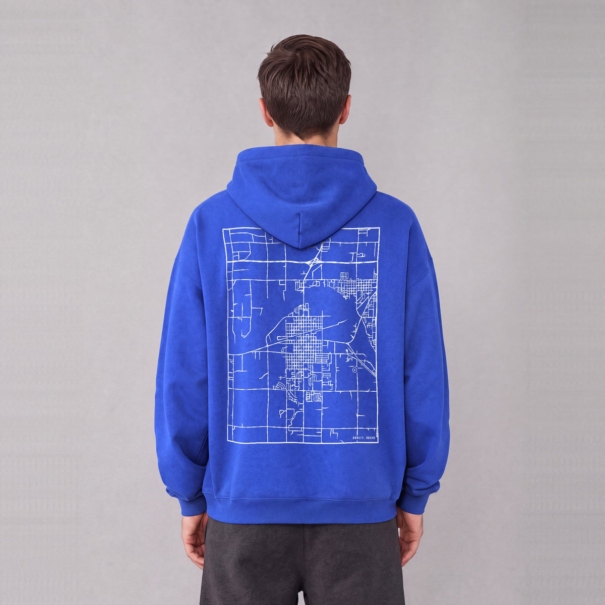 Burley map hoodie, back print on model - Royal Blue