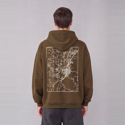 Cedar City map hoodie, back print on model - Coffee