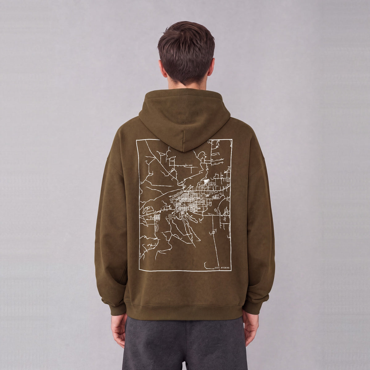 Cody map hoodie, back print on model - Coffee