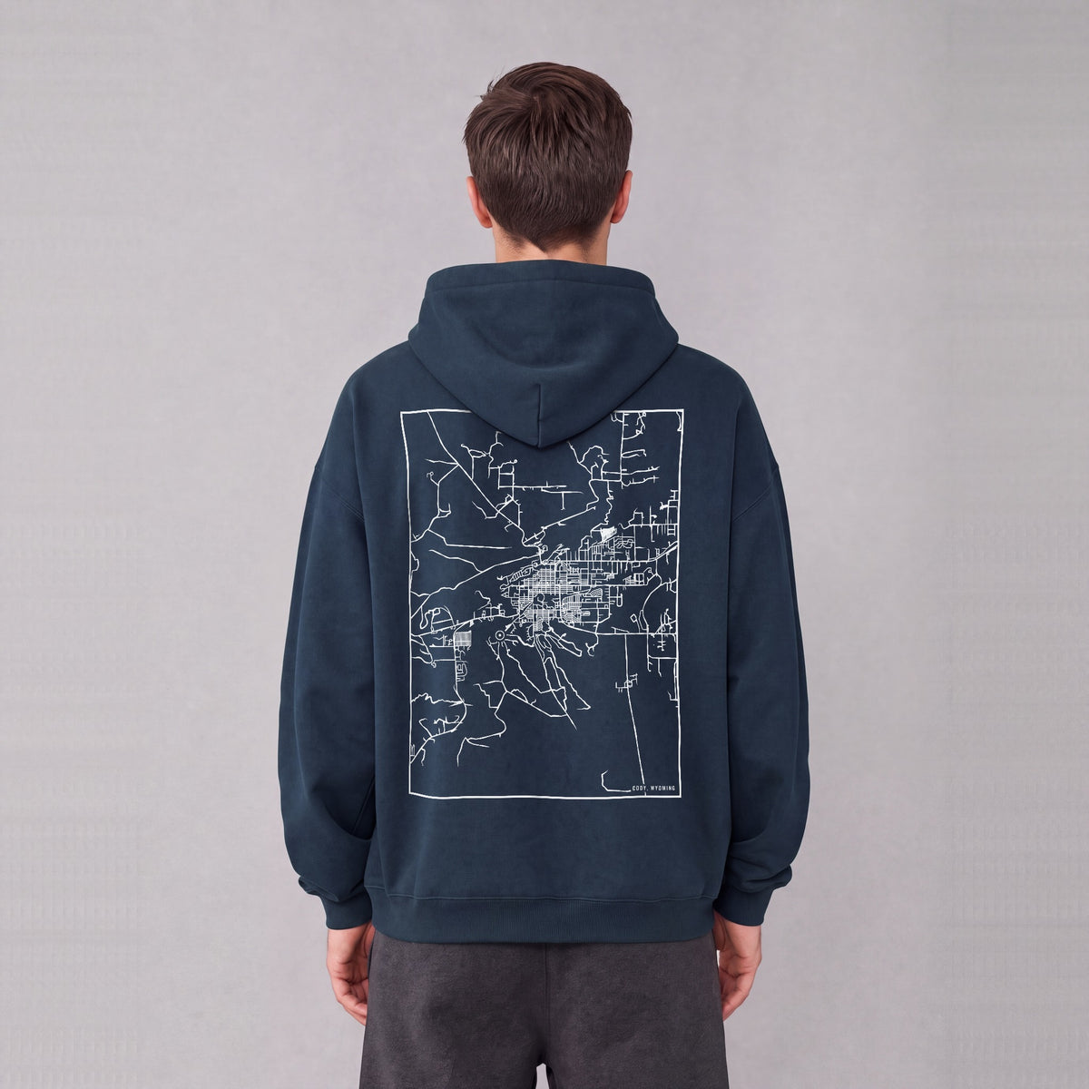 Cody map hoodie, back print on model - Navy Blue