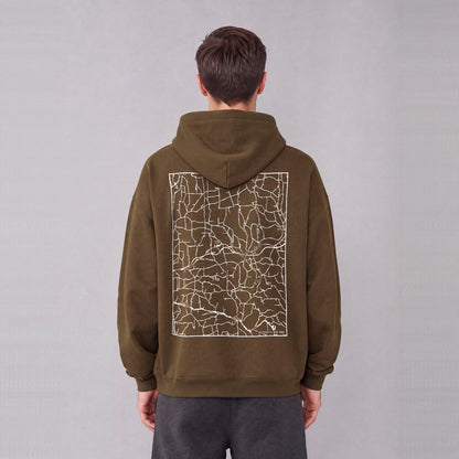 Colesville map hoodie, back print on model - Coffee