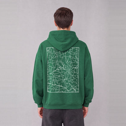 Colesville map hoodie, back print on model - Eden Green