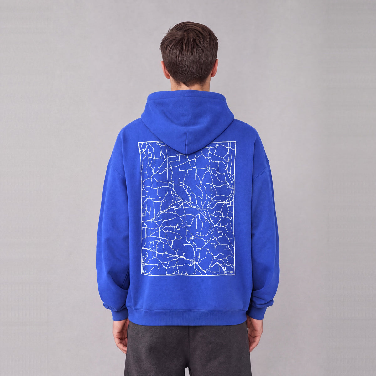 Colesville map hoodie, back print on model - Royal Blue