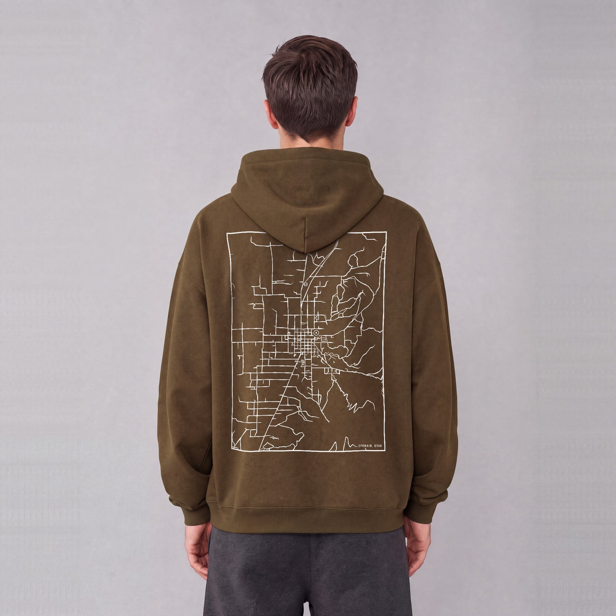 Ephraim map hoodie, back print on model - Coffee