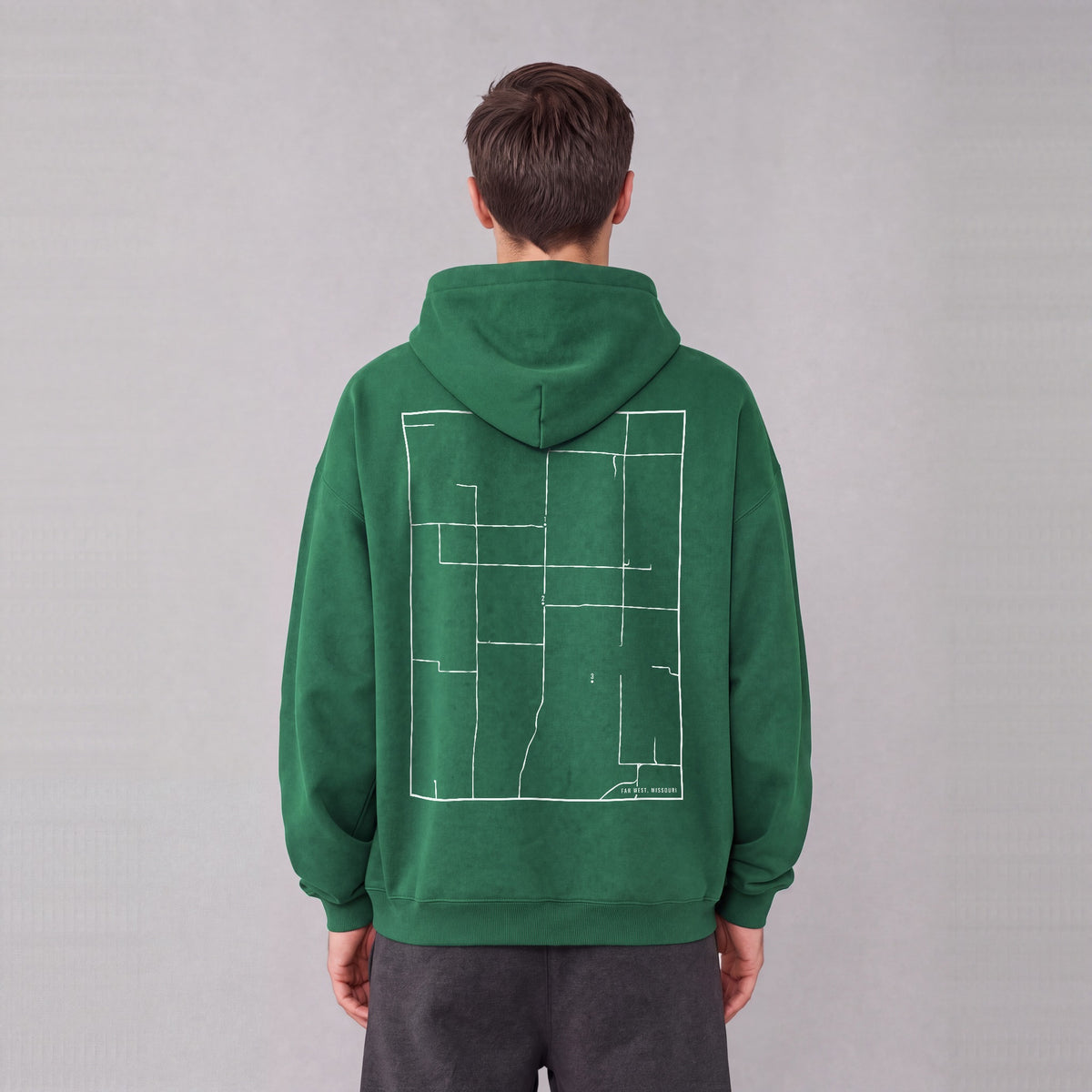 Far West map hoodie, back print on model - Eden Green