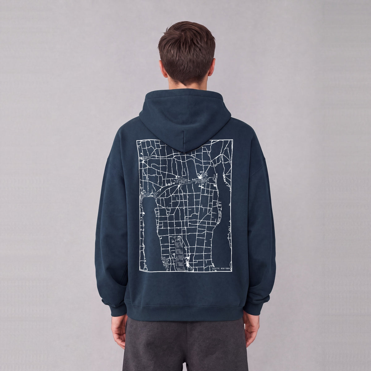 Fayette map hoodie, back print on model - Navy Blue