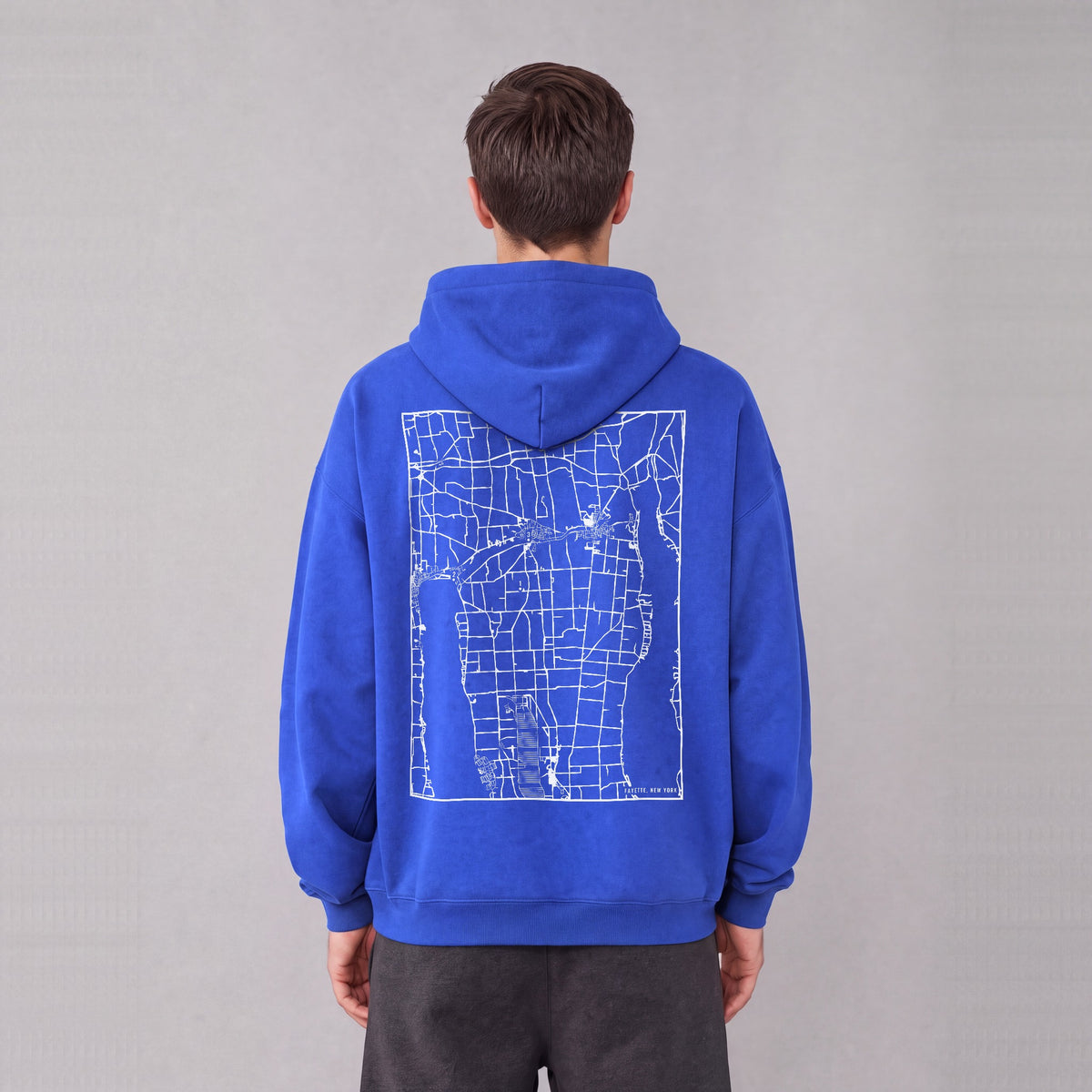 Fayette map hoodie, back print on model - Royal Blue