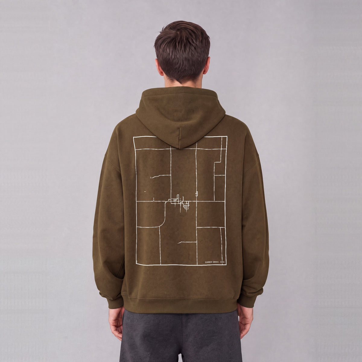 Garden Grove map hoodie, back print on model - Coffee