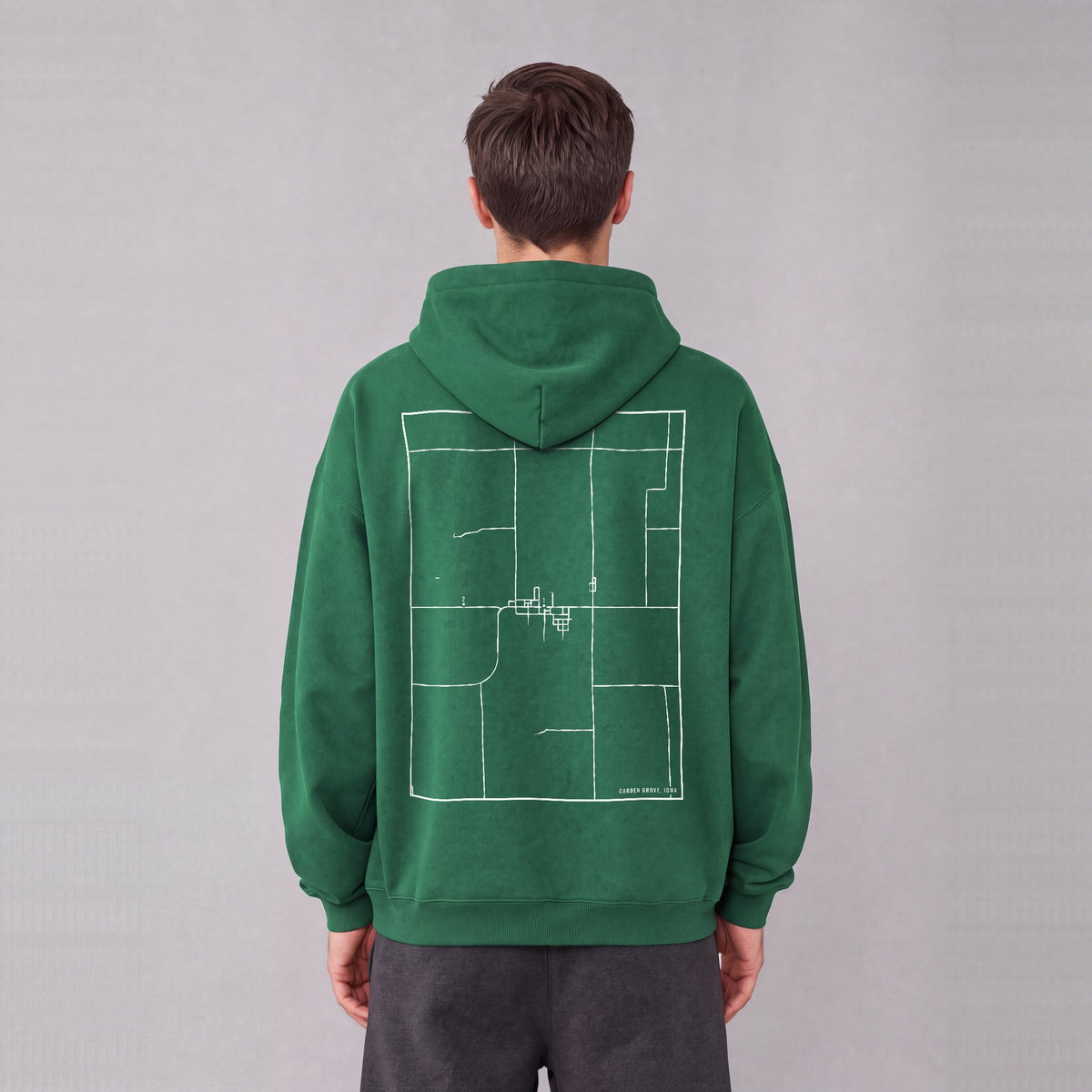 Garden Grove map hoodie, back print on model - Eden Green