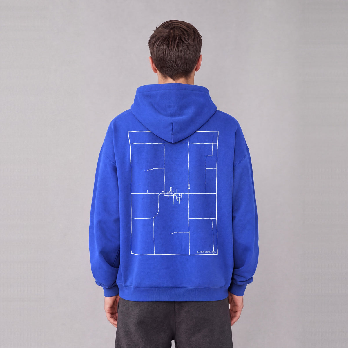 Garden Grove map hoodie, back print on model - Royal Blue