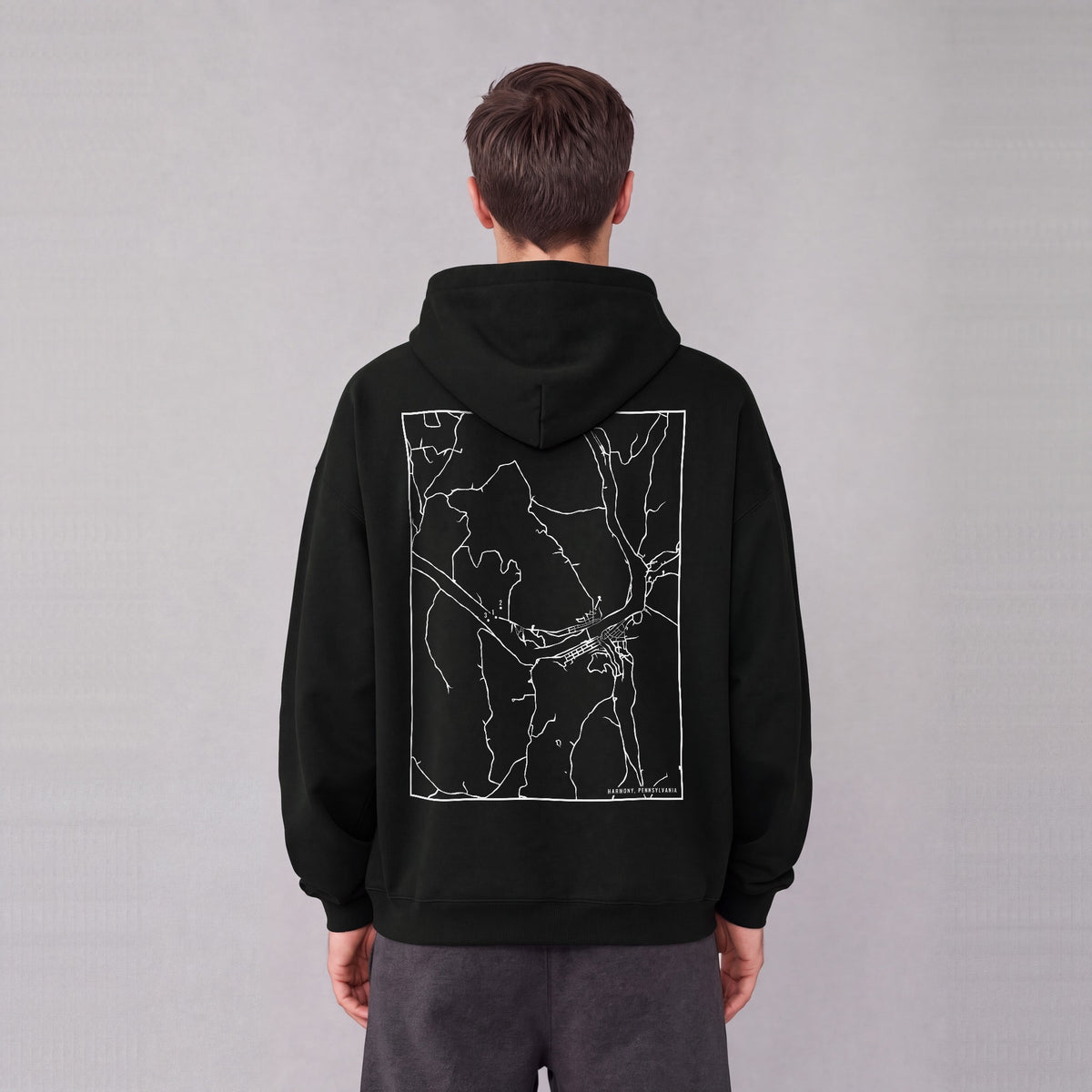 Harmony map hoodie, back print on model - Black