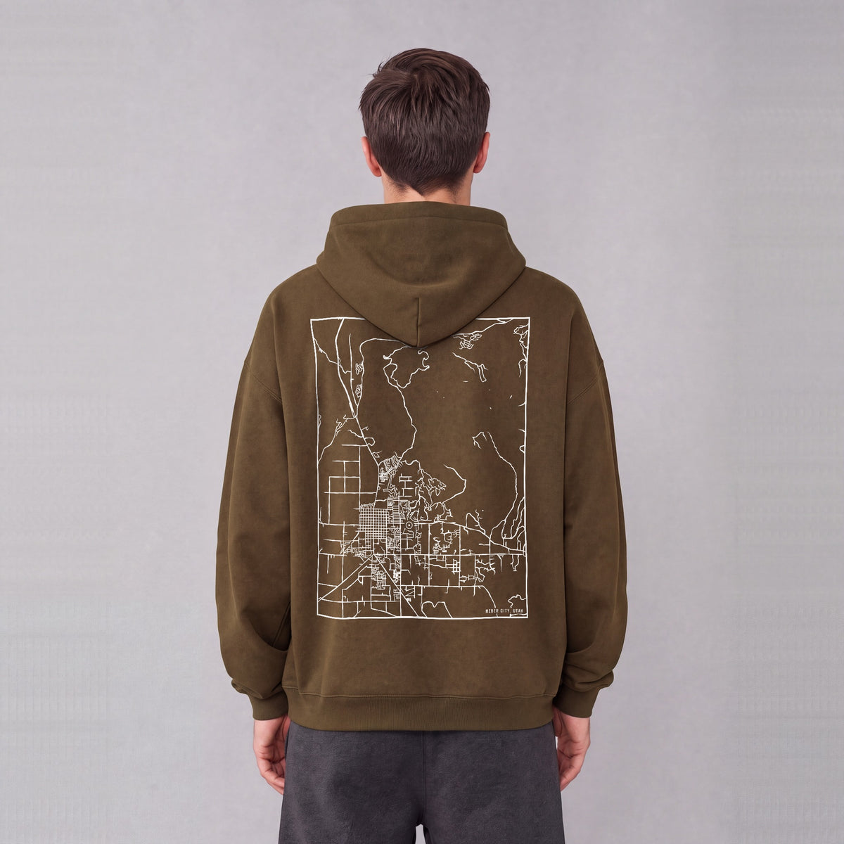 Heber City map hoodie, back print on model - Coffee
