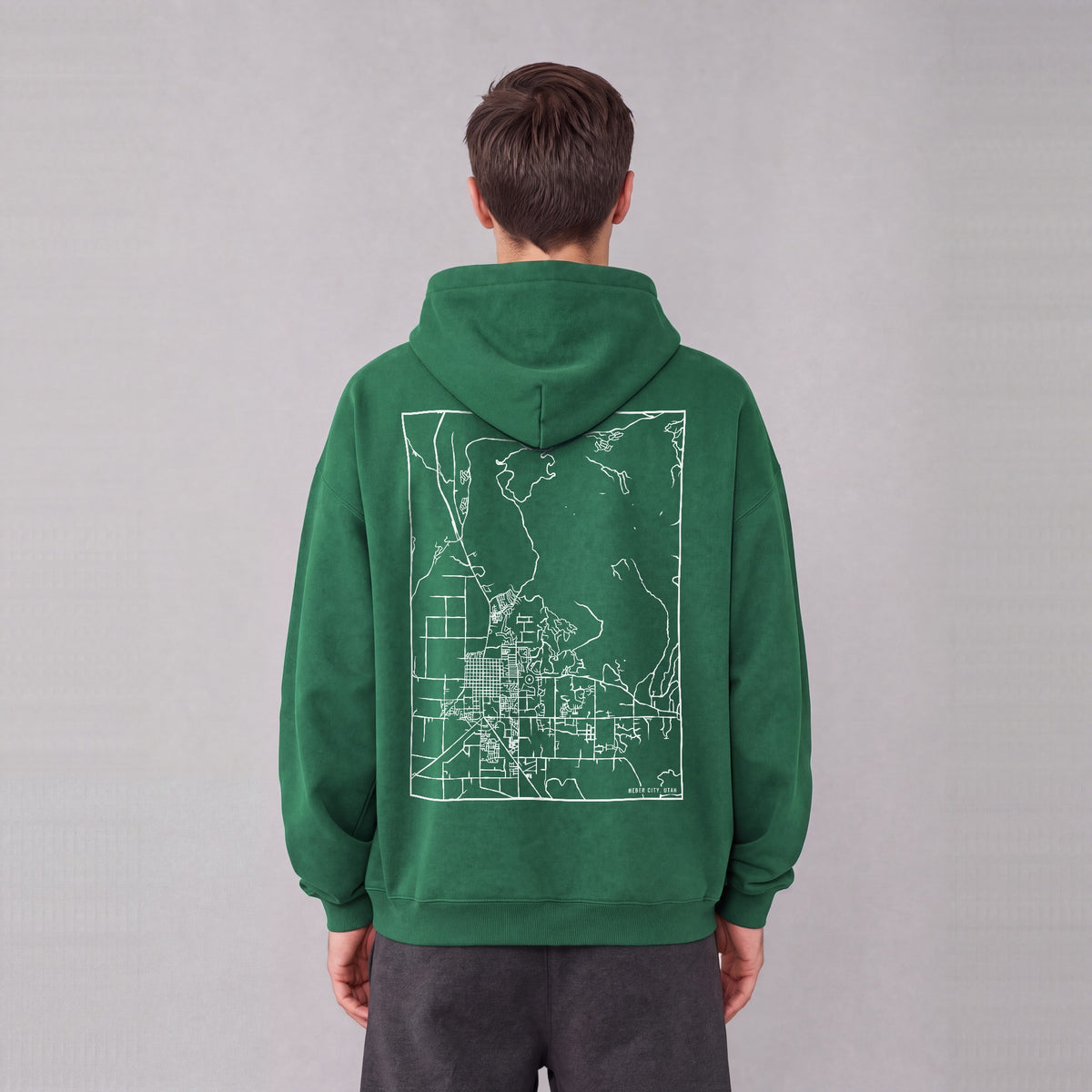Heber City map hoodie, back print on model - Eden Green