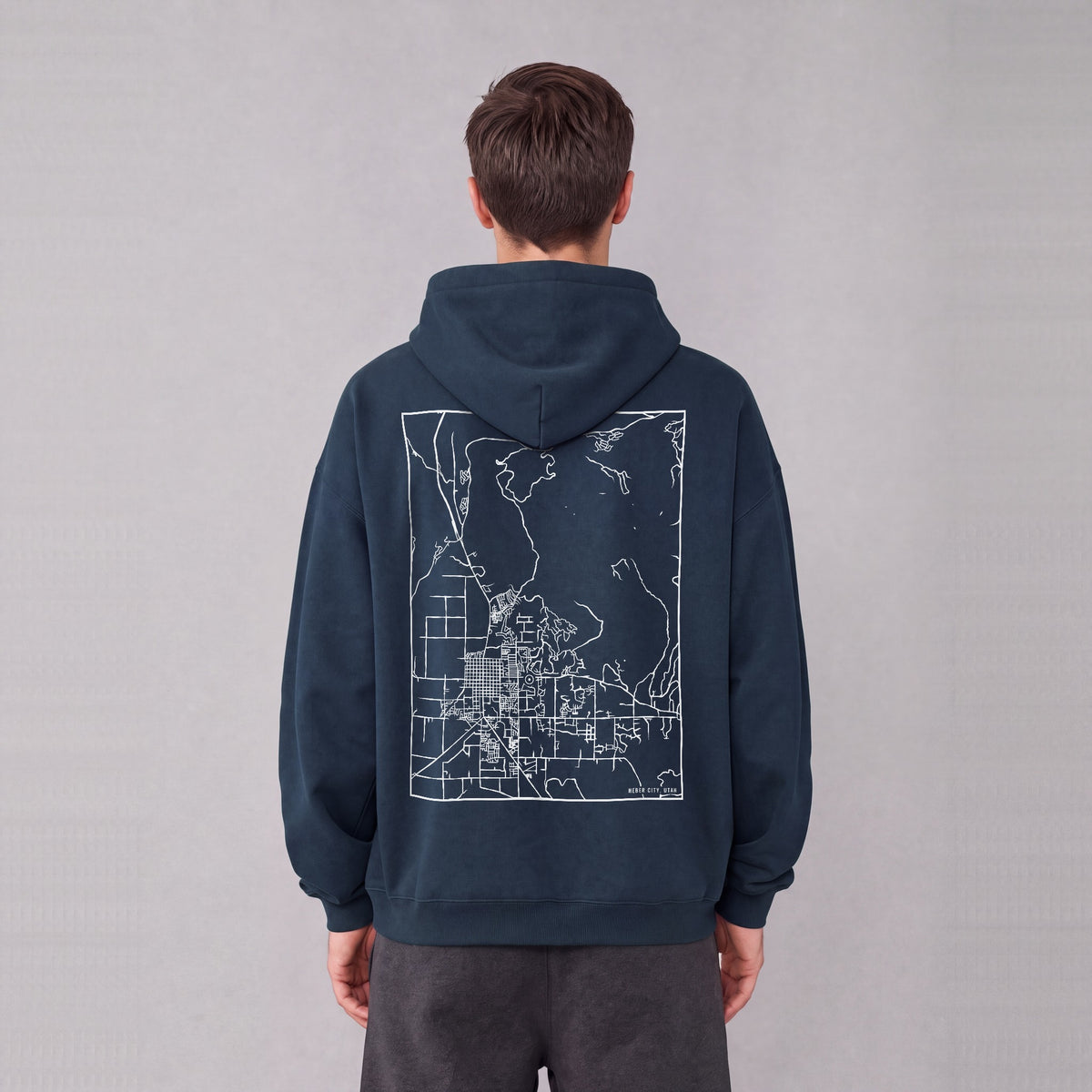 Heber City map hoodie, back print on model - Navy Blue
