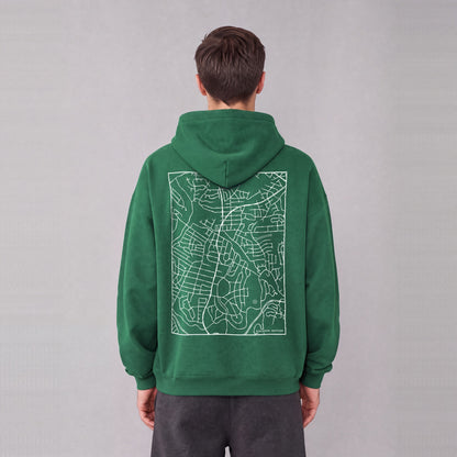 Kensington map hoodie, back print on model - Eden Green