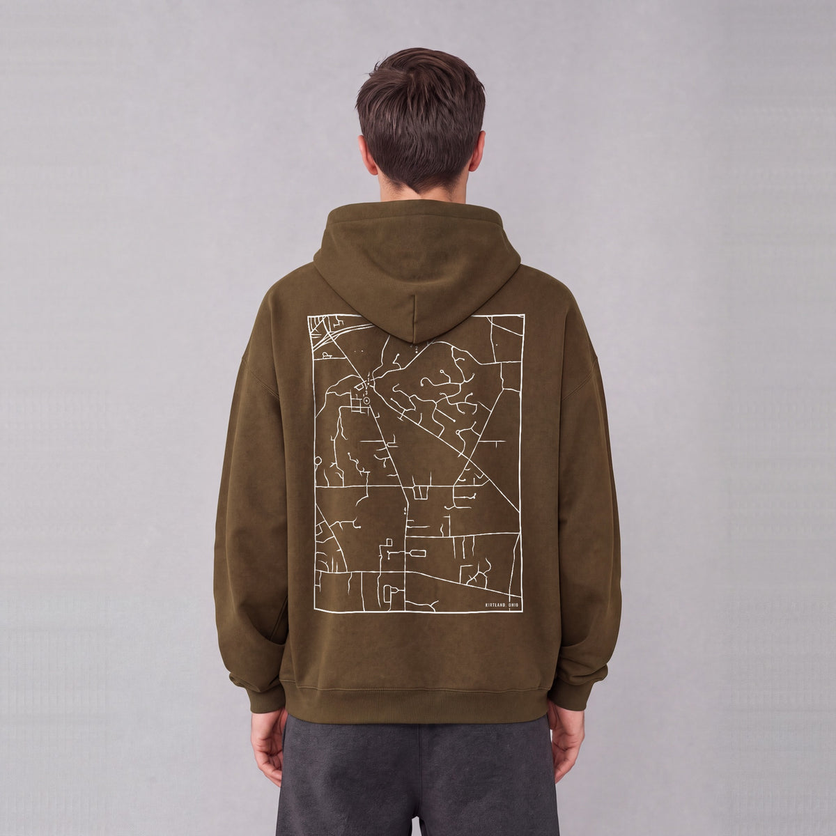 Kirtland map hoodie, back print on model - Coffee