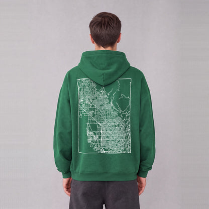 Lindon map hoodie, back print on model - Eden Green
