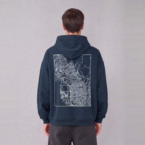 Lindon map hoodie, back print on model - Navy Blue