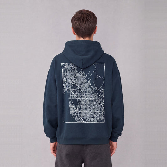 Lindon map hoodie, back print on model - Navy Blue
