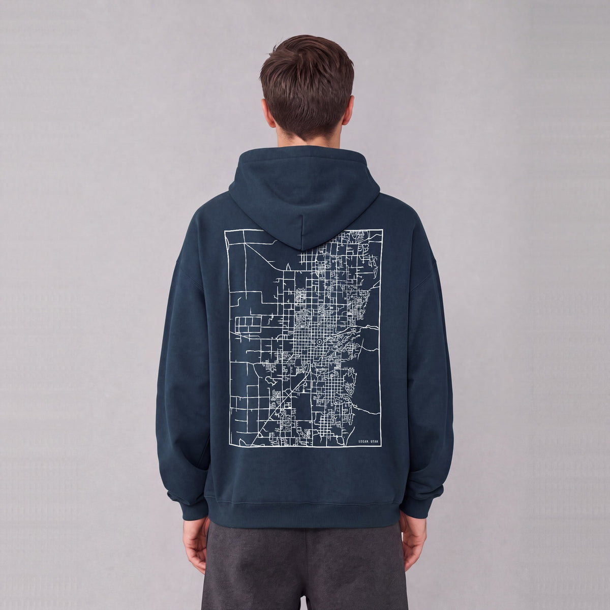 Logan map hoodie, back print on model - Navy Blue