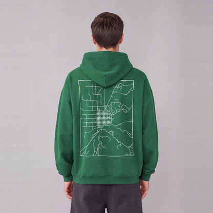 Manti map hoodie, back print on model - Eden Green