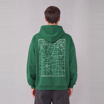 Mendon map hoodie, back print on model - Eden Green