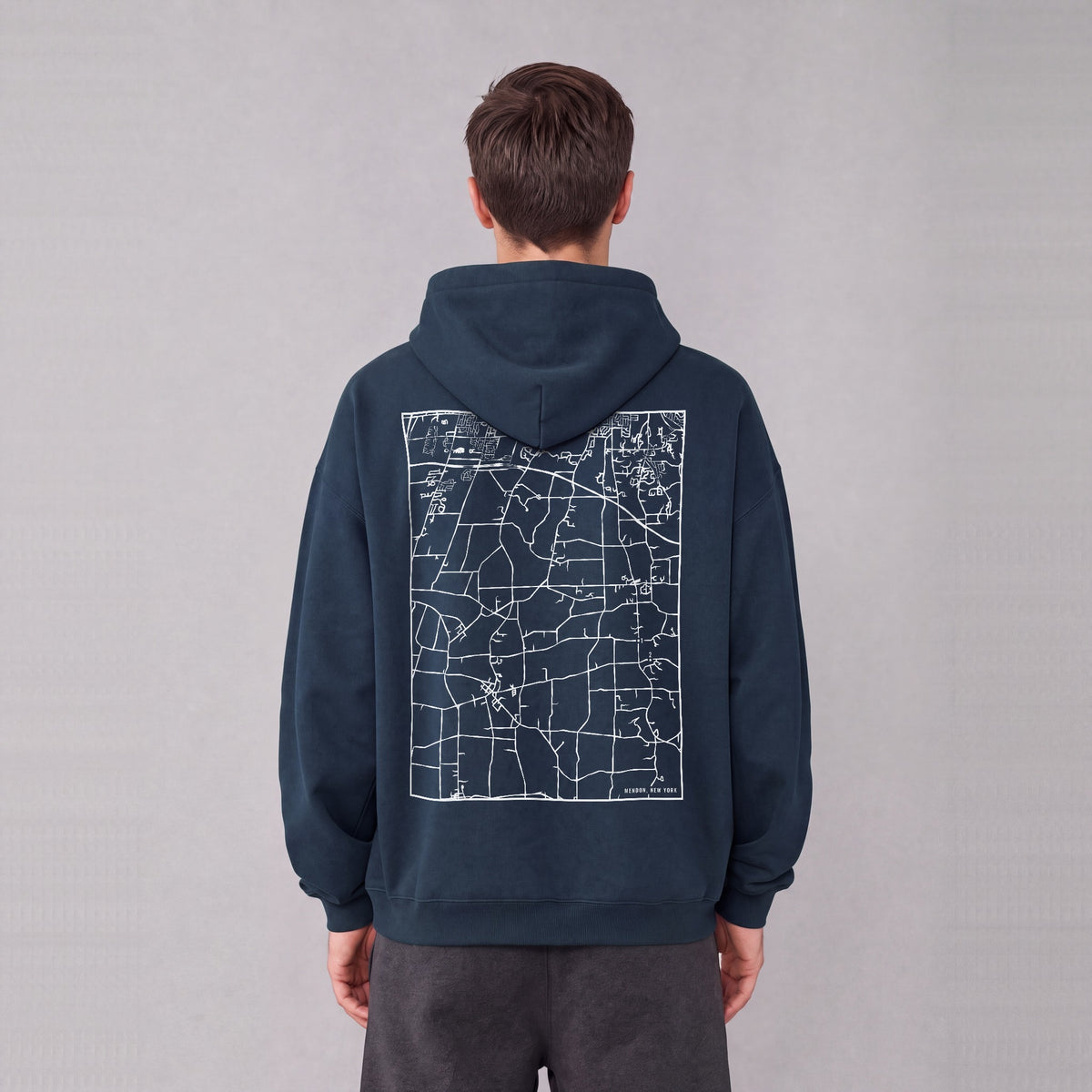 Mendon map hoodie, back print on model - Navy Blue