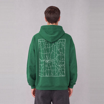 Palmyra map hoodie, back print on model - Eden Green