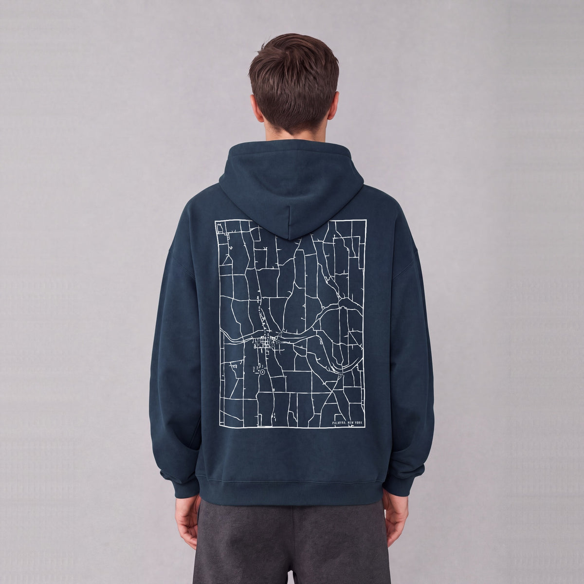 Palmyra map hoodie, back print on model - Navy Blue