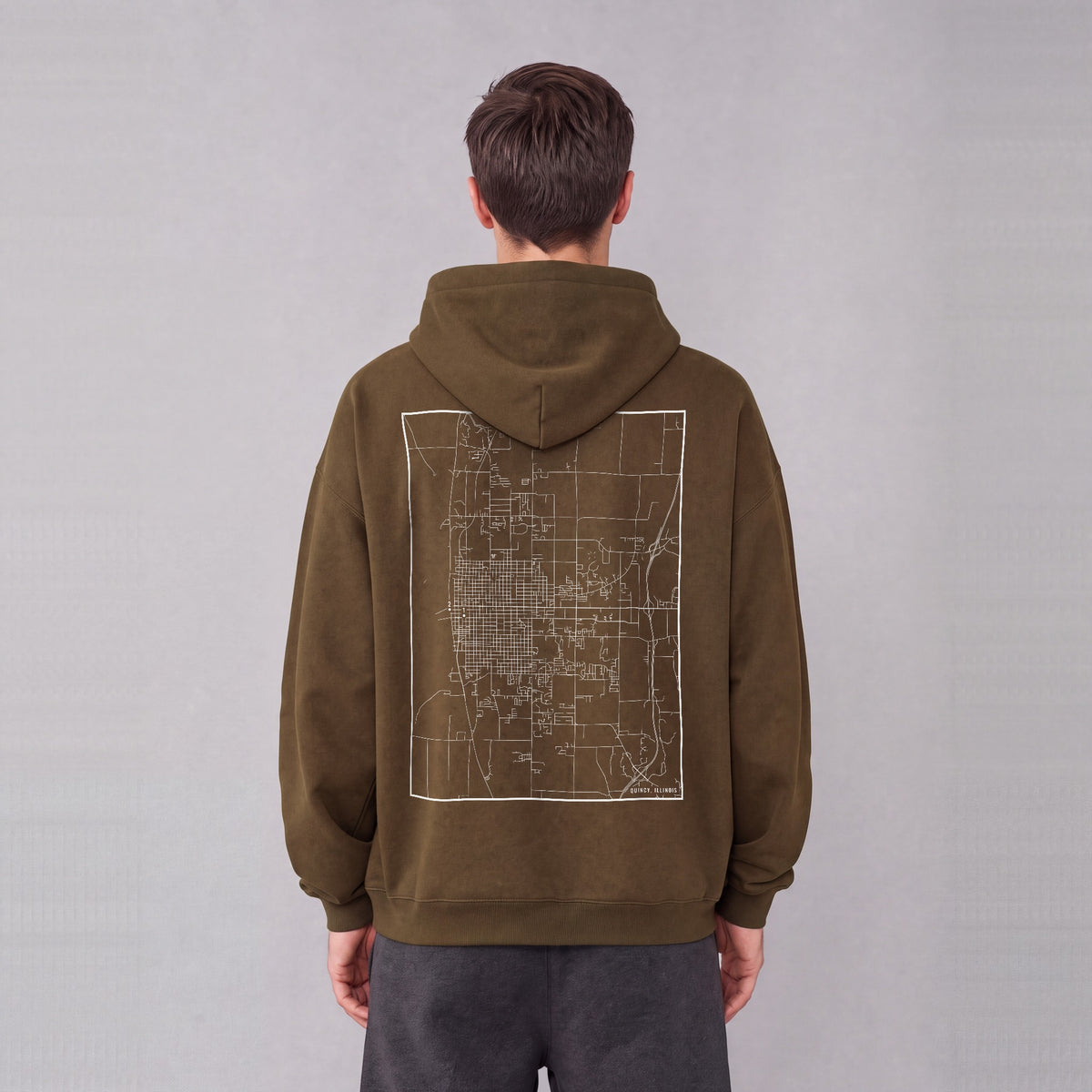 Quincy map hoodie, back print on model - Coffee