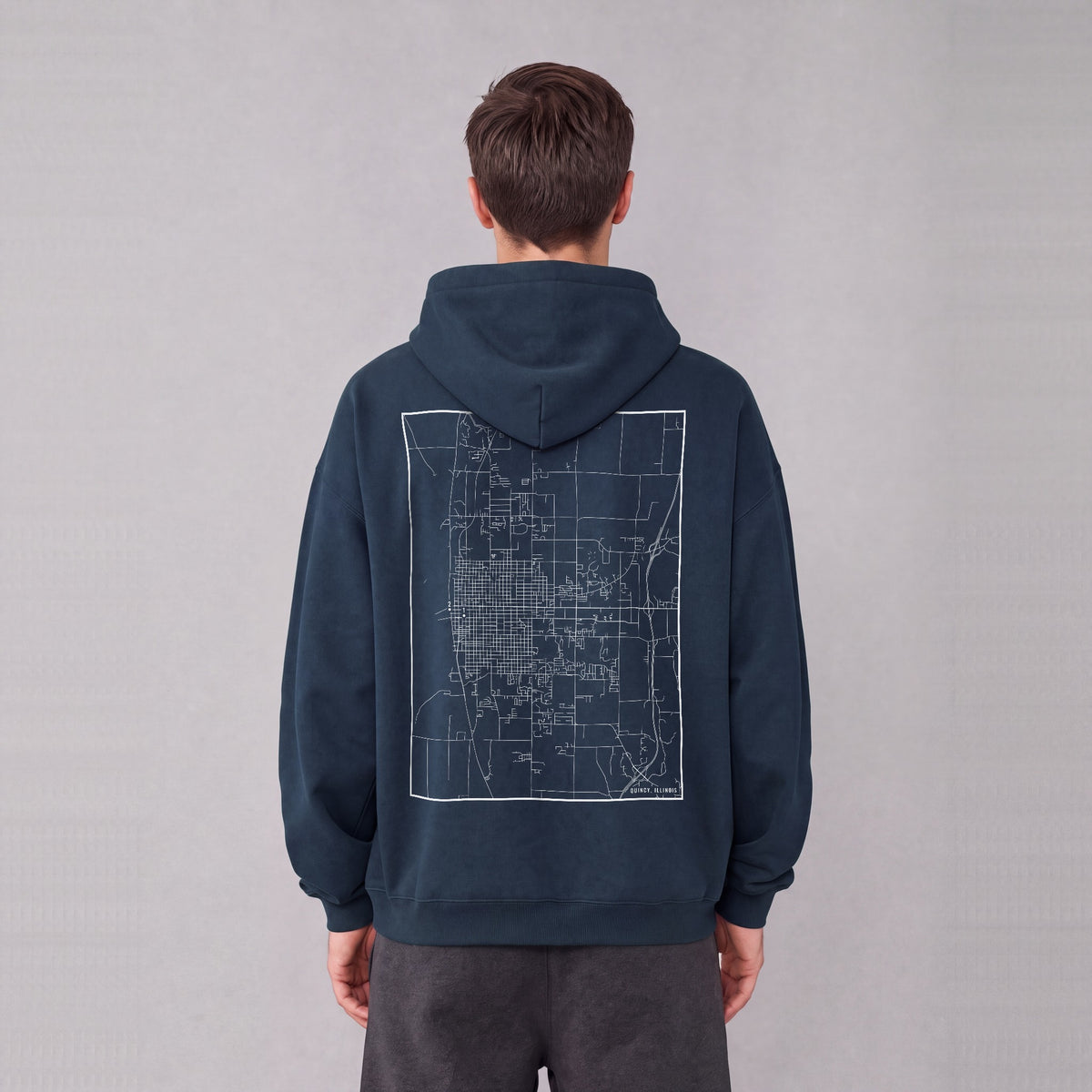 Quincy map hoodie, back print on model - Navy Blue