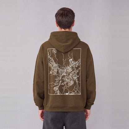 St. George map hoodie, back print on model - Coffee