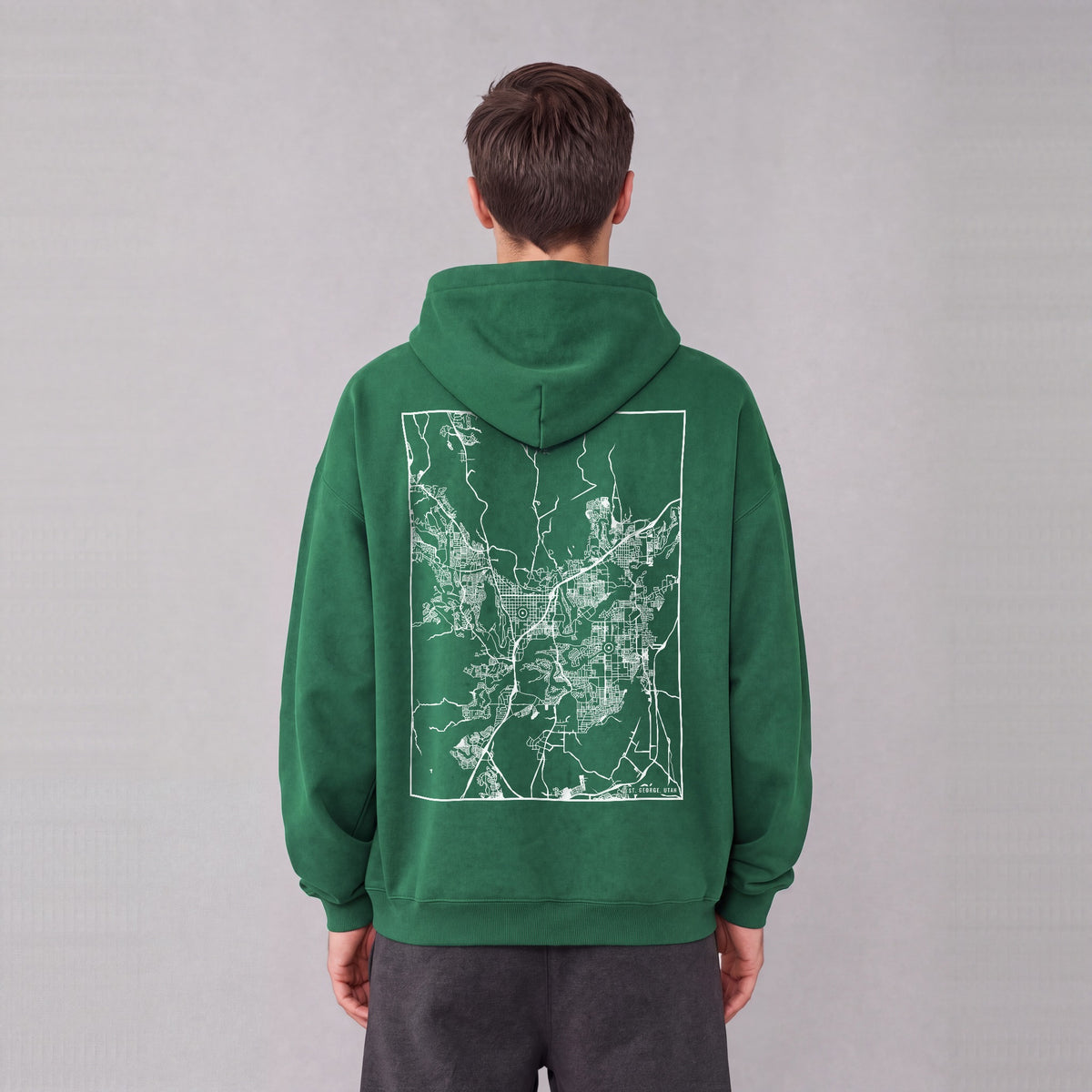 St. George map hoodie, back print on model - Eden Green