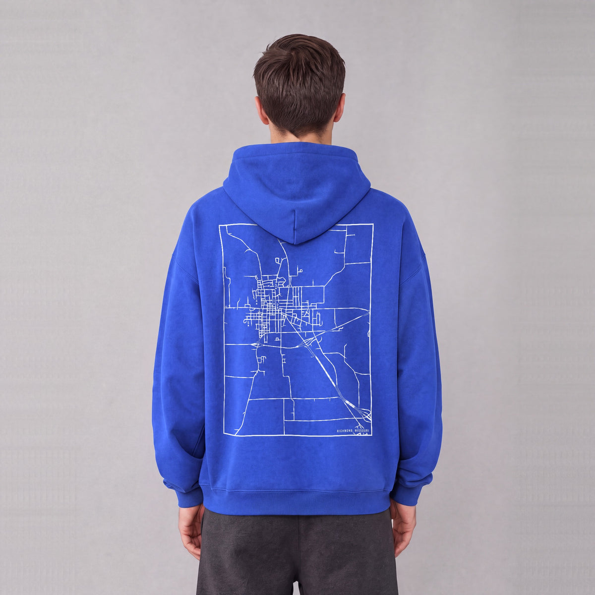 Richmond map hoodie, back print on model - Royal Blue