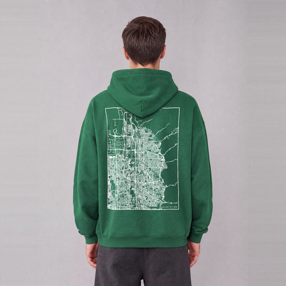 Salt Lake City map hoodie, back print on model - Eden Green