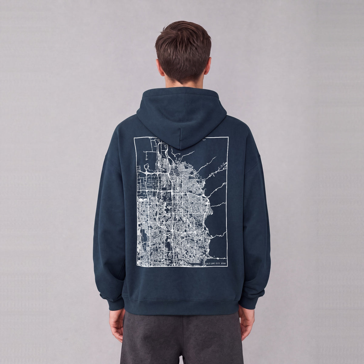 Salt Lake City map hoodie, back print on model - Navy Blue